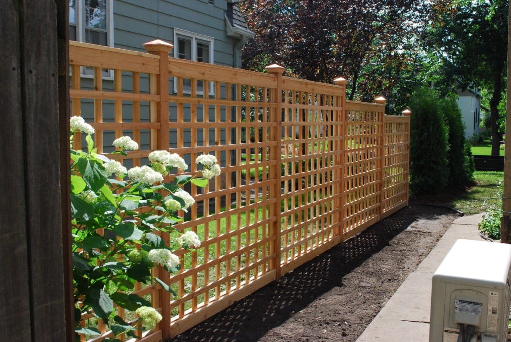 Timber lattice screen panels used for privacy along a side boundary
